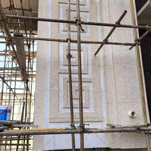 哈密 黄金麻花岗岩别墅外墙干挂回纹造型效果