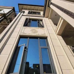 哈密 黄金麻荔枝面别墅外墙干挂效果展示