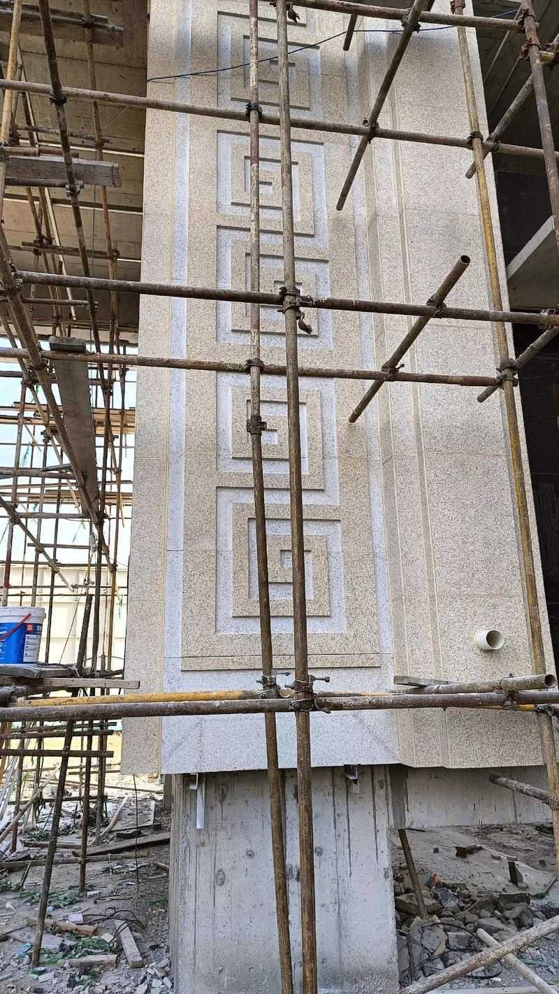 哈密 黄金麻花岗岩别墅外墙干挂回纹造型效果