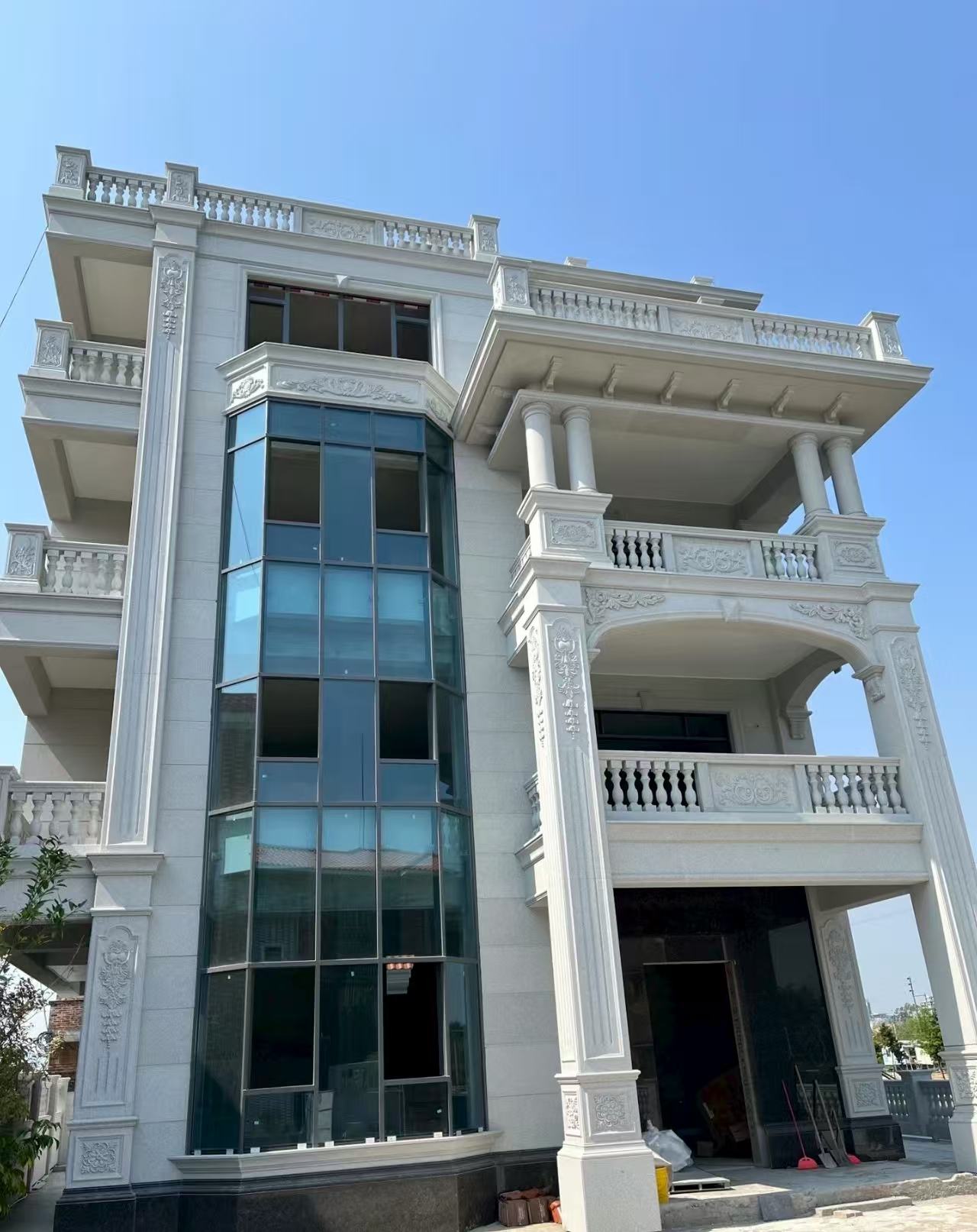 哈密 白麻花岗岩别墅外墙干挂效果展示